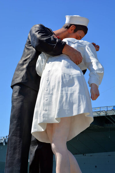SAN DIEGO USA - APRIL 8 2015: Unconditional Surrender sculpture at sea port in San Diego. By Seward Johnson, the statue resembles the photograph of Alfred Eisenstaedt of VJ day in Times Square New York