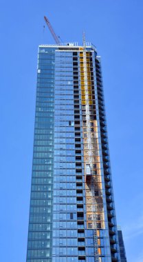 MONTREAL QUEBEC CANADA - 05 07 2020: The Tour des Canadian ens 1,2 ve 3 Montreal, Quebec, Kanada 'da bulunan bir gökdelen kompleksi. Montreal şehir merkezindeki Bell Center 'ın yanında yer almaktadır.
