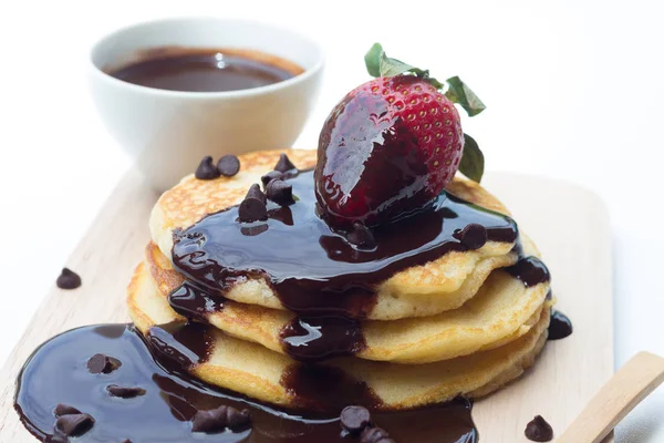 Pancakes with chocolate syrup and strawberry — Stock Photo, Image