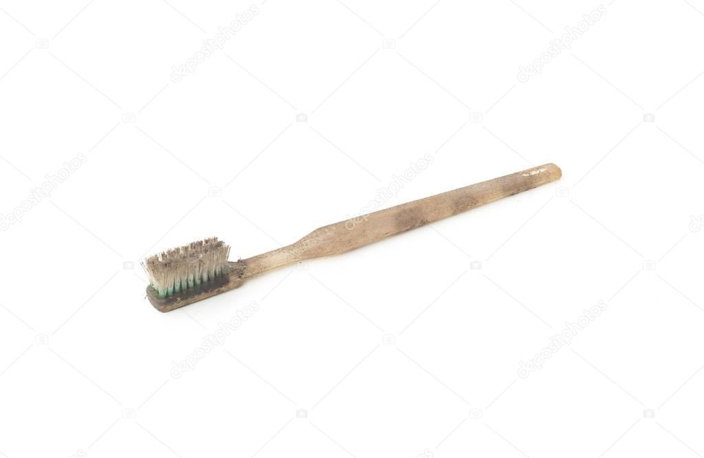 Dirty and worn out toothbrush 