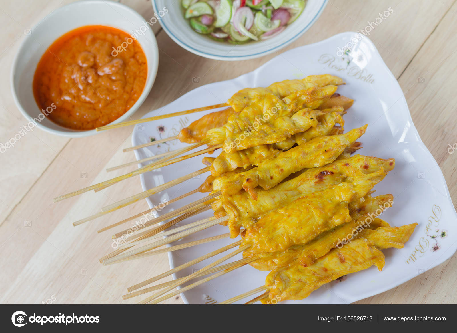 Grilled chicken satay with peanut sauce and vinegar of vegetable