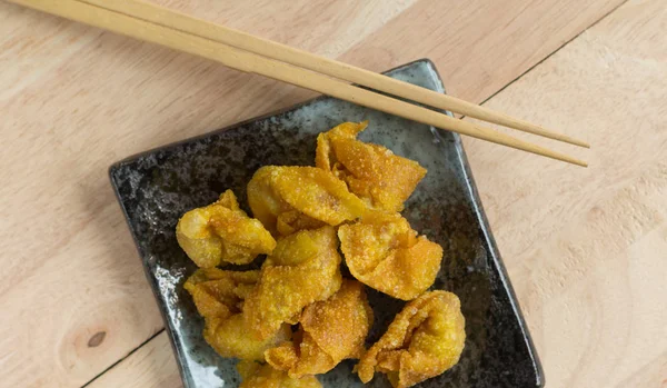 Deep fried dumpling or wonton with pork stuffed — Stock Photo, Image