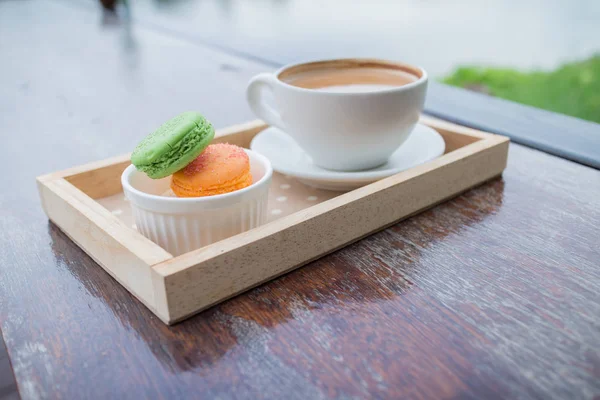 hot coffee breakfast set with fresh macaron