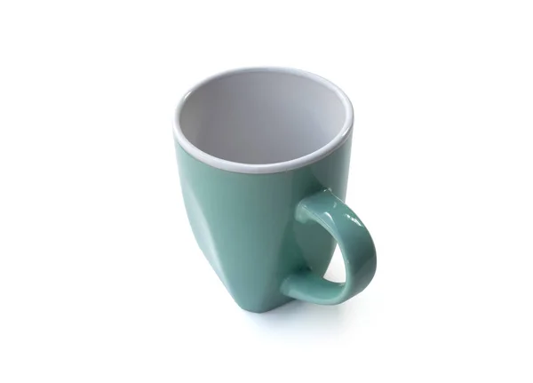Зеленая чашка кофе с простым дизайном изолированы на белом фоне — стоковое фото
