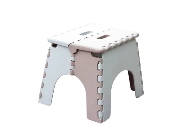 Pequena cadeira de plástico com design criativo no fundo branco — Fotografia de Stock