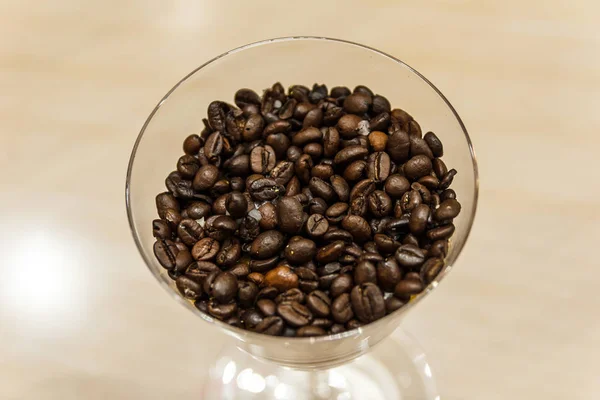 Coffee bean in glass. — Stock Photo, Image