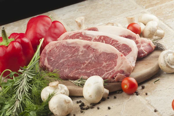 Raw Fresh Meat Steak Ribeye Marble Greens Tomatoes Mushrooms Plate — Stock Photo, Image