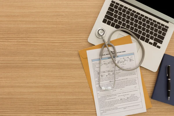 medical records, stethoscope , medical record application form