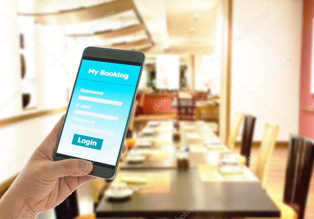 The use of smart phones, mobile restaurant reservations. technology concepts.