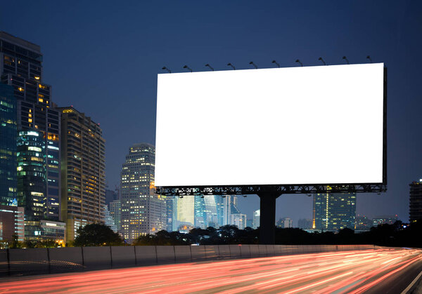 Blank billboard with a background of city. With clipping path on screen - can be used for trade shows, and advertising or promotional poster for you.
