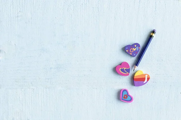 Different Eraser Shape Heart Pencil Blue Background Space Text — Stock Photo, Image