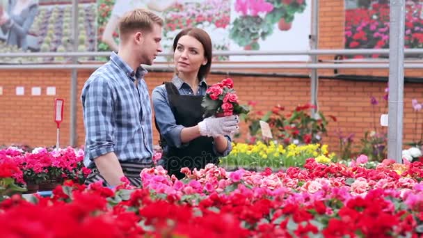 Florists satisfied with their work. — Stock Video