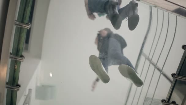 View Glass Floor People Talking Meeting Stairs Handshake Embrace — Stock Video