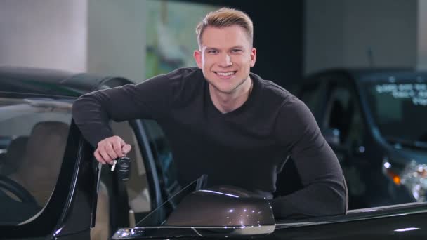 Close Young Handsome Man Holding Key New Modern Car — Stock Video