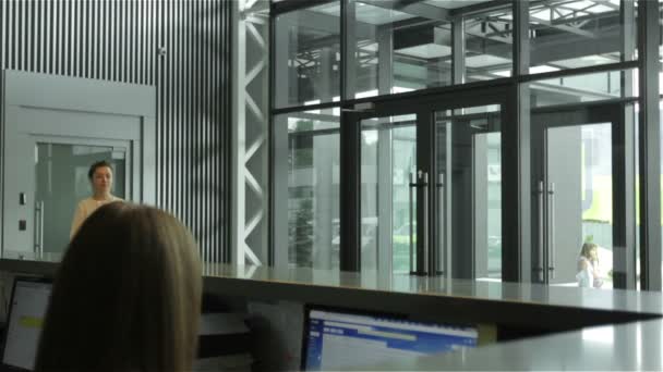 Young Business Women Working Reception Modern Building — Stock Video