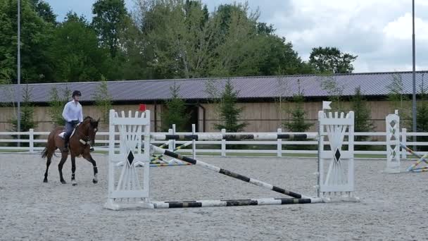 Man jump through ride-off on Horse — Stock Video