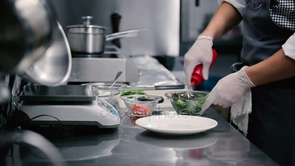 Close-up of male cooking salad — Stock Video