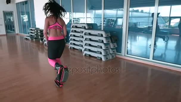 Young woman in kangoo shoes — Stock Video