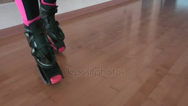 Woman legs in kangoo shoes — Stock Video