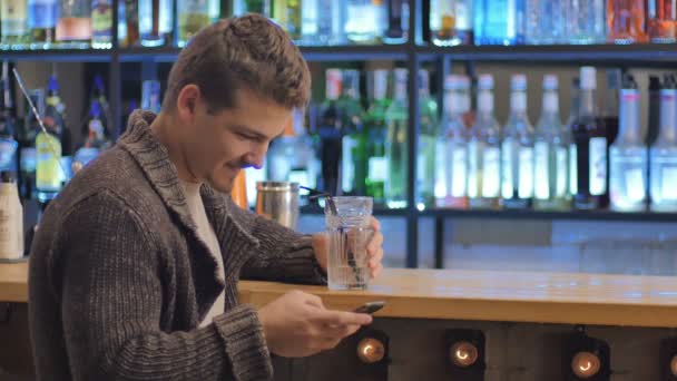 Handsome guy drink coctail — Stock Video