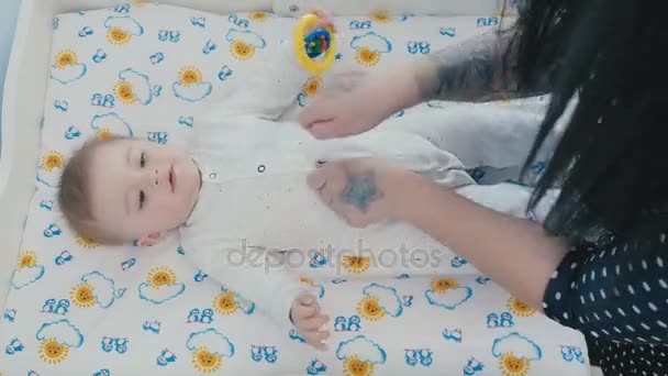 Hands touching the little kid — Stock Video