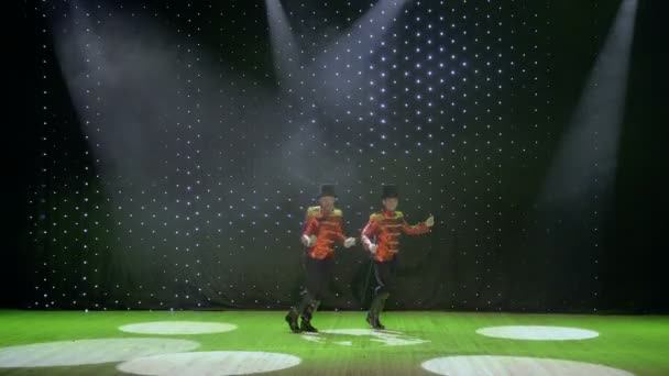 Artistic gentlemen are dancing on stage in theatre — Stock Video