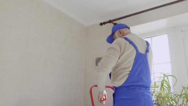 Mature Man Repair Cornice For Curtains Stock Video C Photo Oles
