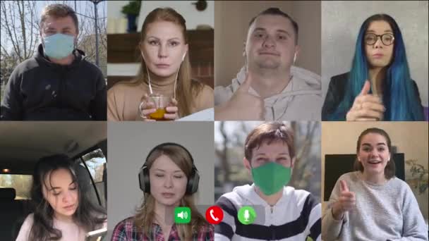 Company of Caucasian people chatting online. Multiscreen of eight cheerful men and women in and without face masks talking and rejoicing, showing thumbs up and agreeing. Remote work, Covid-19 business — Stock Video