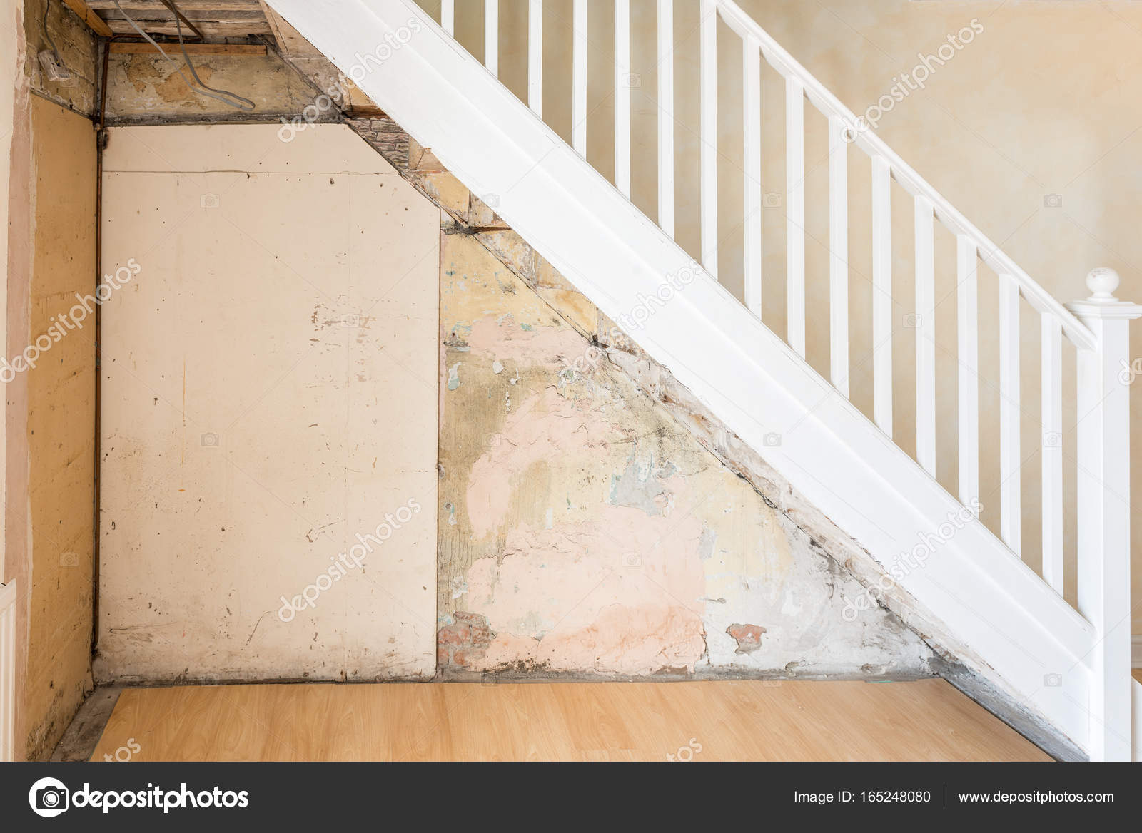 Old Bare Wall And Stairs During Renovations Stock Photo Caymia Wall In An Old House Stripped Back Ready To Be Plastered Domestic Room With White Wooden Staircase During Renovations Photo By Caymia