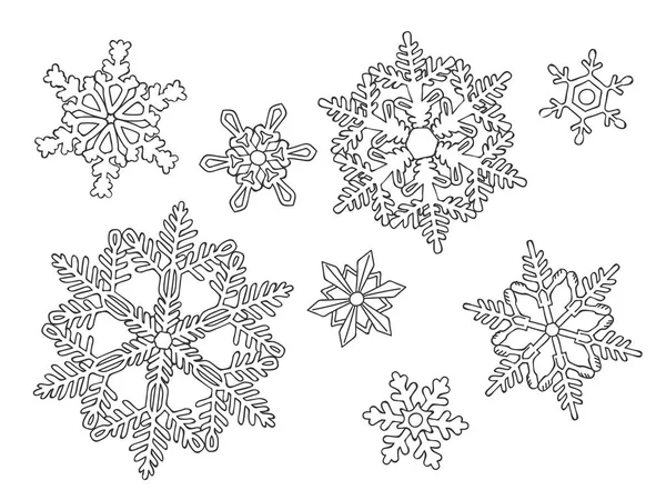 Flocons de neige dessinés à la main sur le blanc — Image vectorielle