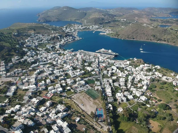 Patmos, Greece - April 04, 2019: air view on the village and port side at sunny weather — стокове фото