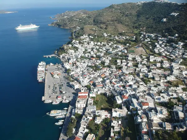 Patmos, Greece - April 04, 2019: air view on the village and port side at sunny weather — стокове фото