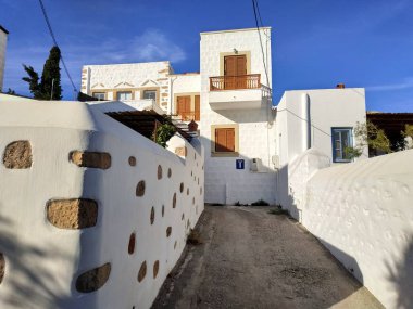 Patmos, Greece - May 07, 2019: view on the sea side streets in the village at sunny weather
