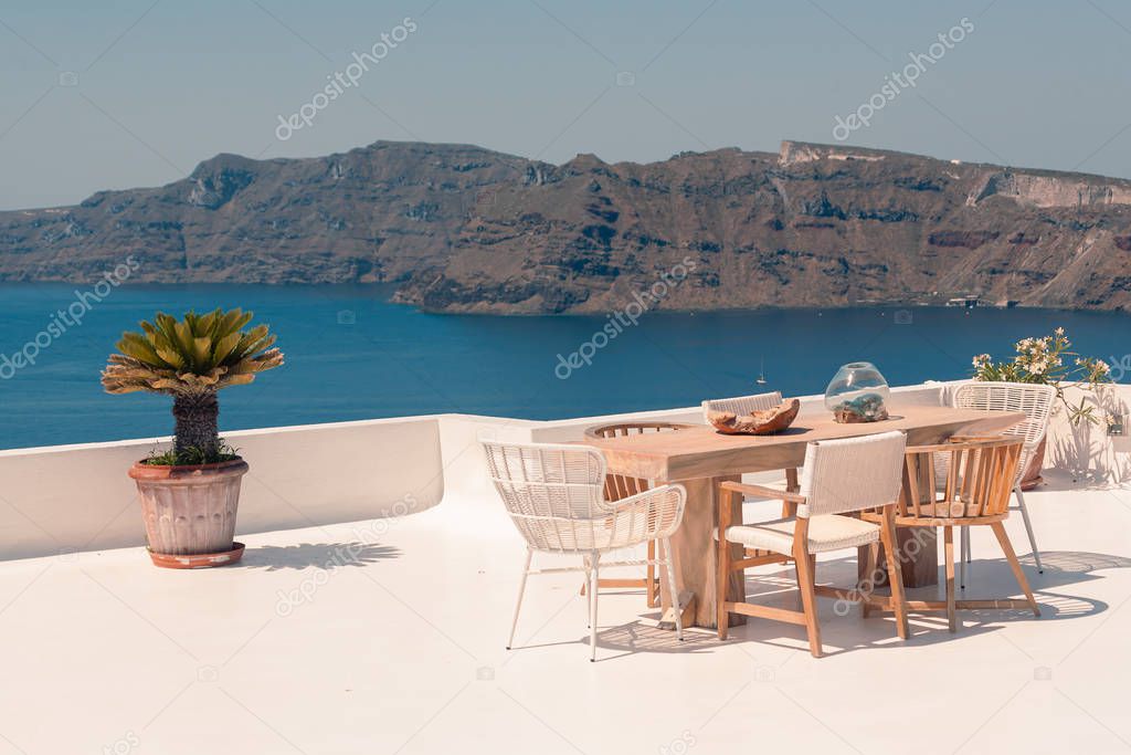 Classical view on the decoration and architecture of Oia village Santorini at sun weather