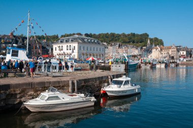 Honfleur, France - October 14, 2019: some casual view on the places and architecture of the village