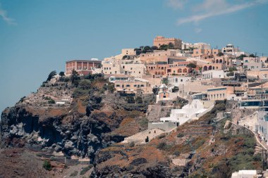 Classical view on the decoration and architecture of Thera Fira village Santorini at sun weather