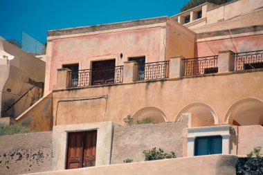 Classical view on the decoration and architecture of Thera Fira village Santorini at sun weather