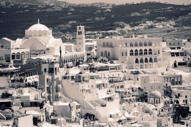 Classical view on the decoration and architecture of Thera Fira village Santorini at sun weather