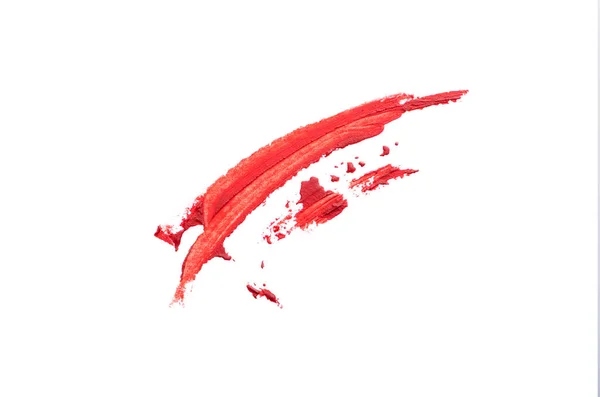 Schmieren Sie den roten Pinsel auf weißem Hintergrund — Stockfoto