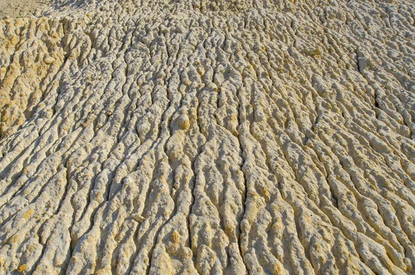 The sand structure is blurred with water — Stock Photo, Image