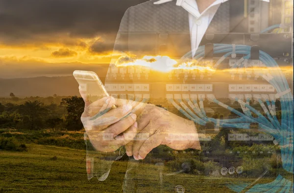 Multi exposure of businessman sunset view and lan switching — Stock Photo, Image
