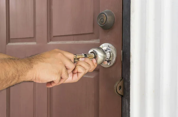 Locksmith use tool for open the door locked — Stock Photo, Image