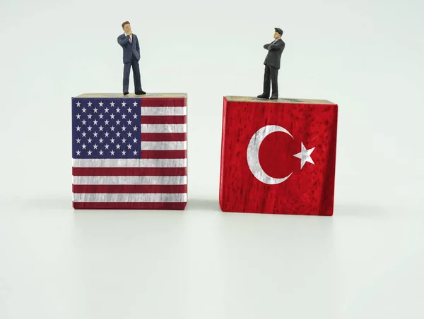 Double mini leader of two country on wood block of nation flag — Stok Foto