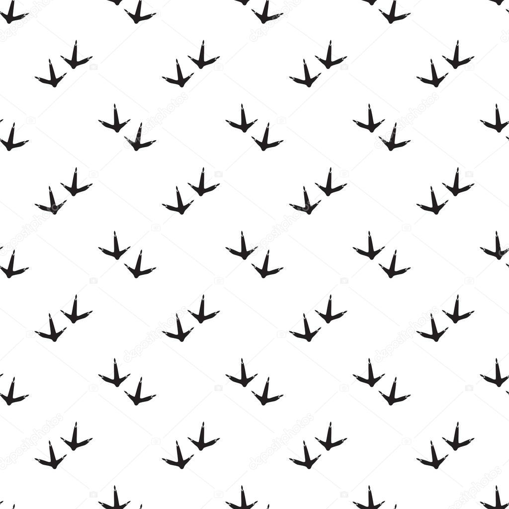 Minimal seamless pattern with dinosaur foots. Black and white colors
