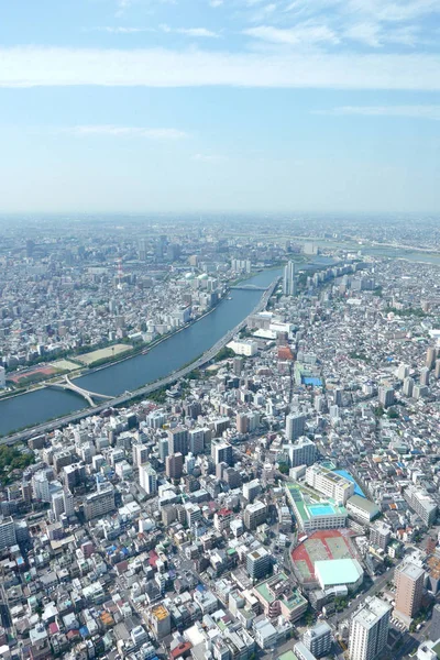 Japan Tokyo cityscape, river, commercial and residential buildin