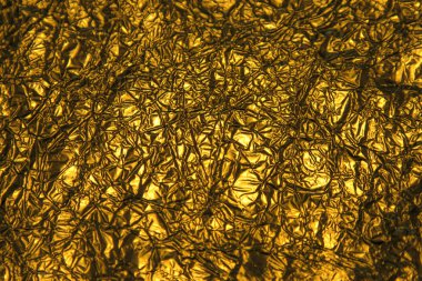 Altın parlak soyut metalik buruşuk kağıt arka plan