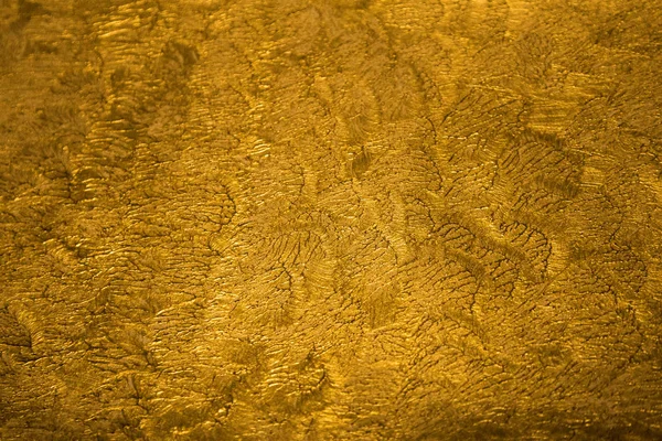 Fondo texturizado brillante metálico dorado con patrón de detalle — Foto de Stock