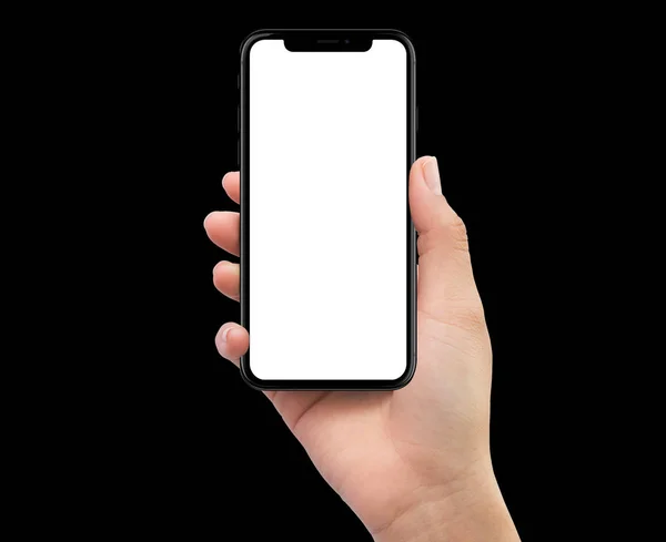 Изолированная правая рука человека с черным мобильным смартфоном — стоковое фото