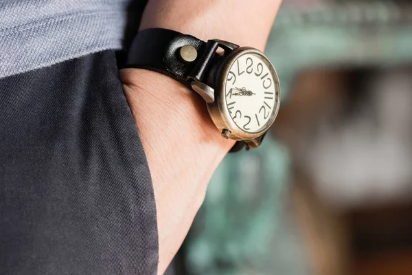 Man wearing old watch on left wrist — Stock Photo, Image