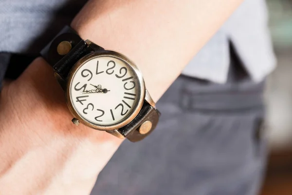 Man wearing old watch on left wrist — Stock Photo, Image